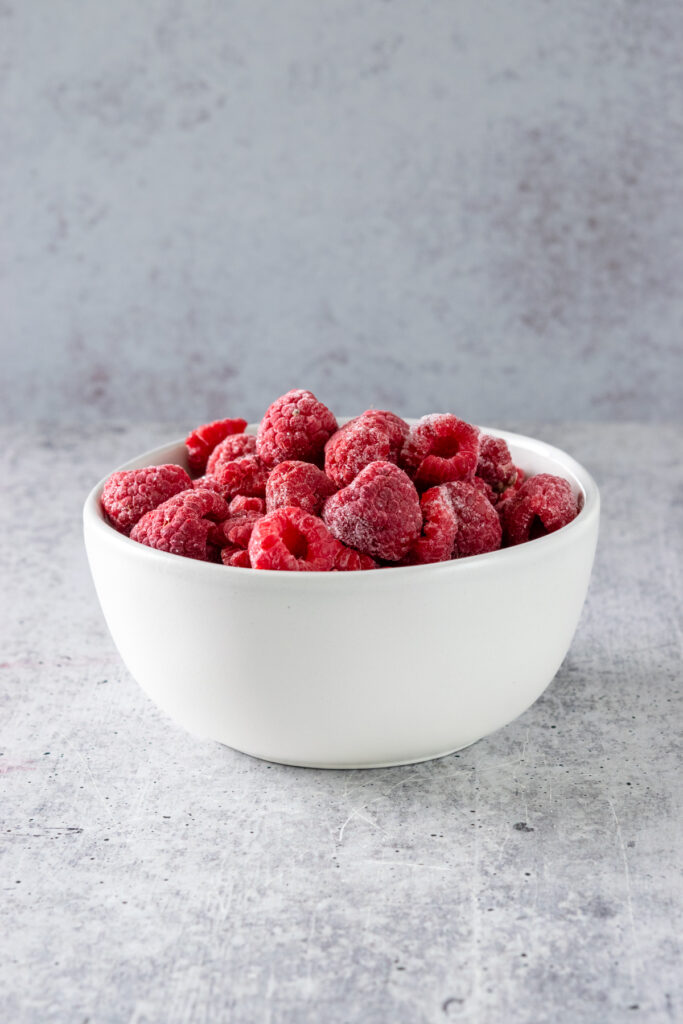 Bowl of frozen raspberries.