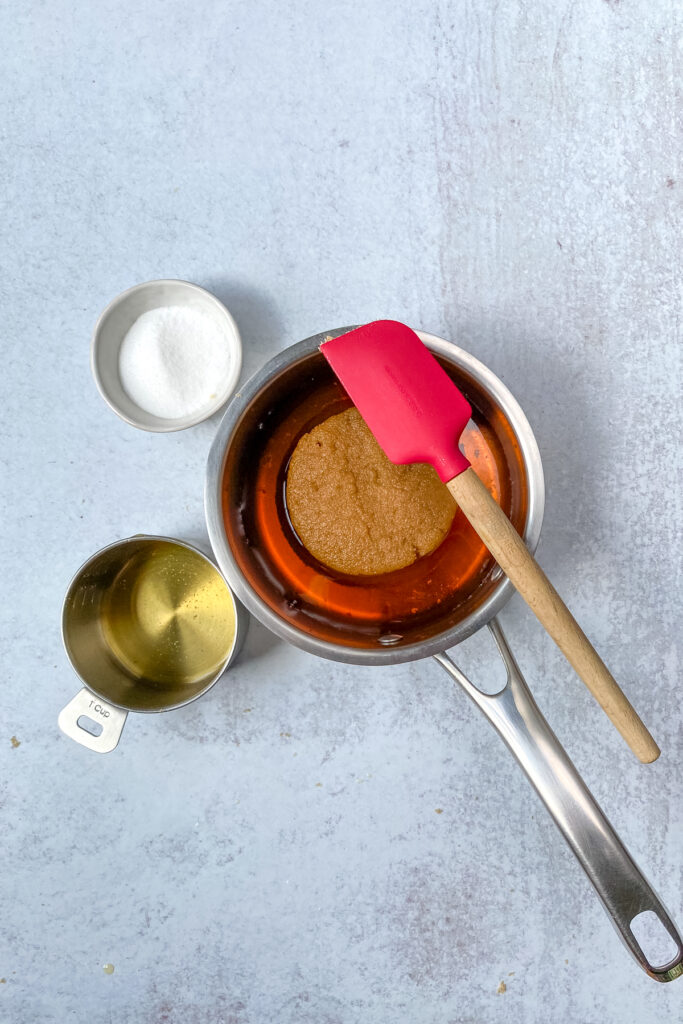 Brown sugar and apple juice concentrate in a small saucepan.