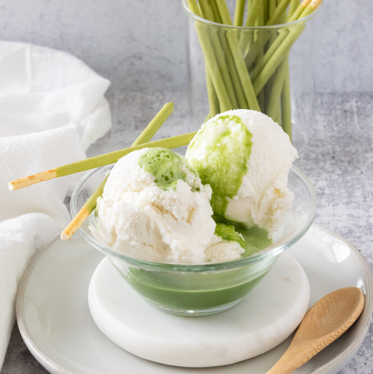 Navigation image for dessert recipes, showing a matcha affogato in a bowl.